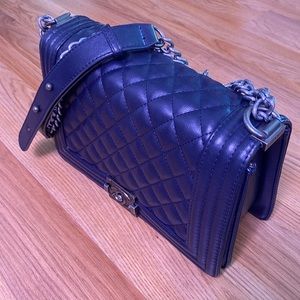 Navy blue bag, preowned but in mint condition .